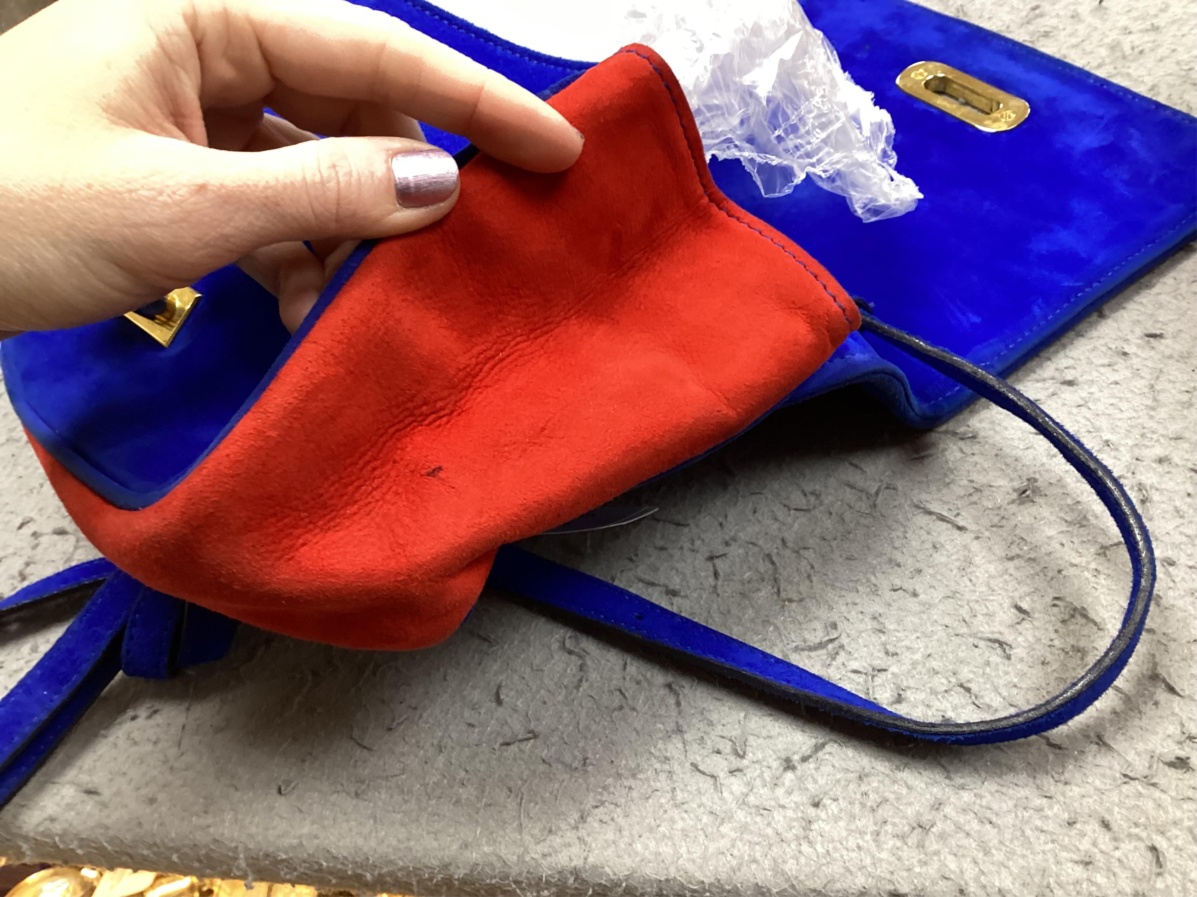 A selection of lady's handbags, including an animal print Stuart Weitzman shoulder bag with dust bag, an Escada suede royal blue and red shoulder bag, and another Escada handbag in navy blue with pink and light green qui